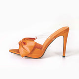 Magas sarkú slingback cipők masnival
