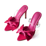 Magas sarkú slingback cipők masnival