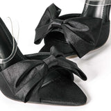 Magas sarkú slingback cipők masnival