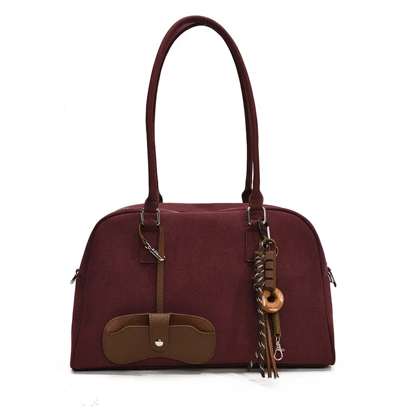 Tágas keresztpántos táska