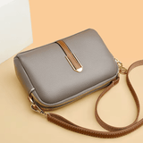 Ez a kompakt crossbody táska ideális mozgalmas napokra