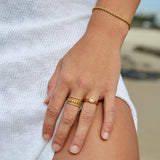 Csavart arany karkötő